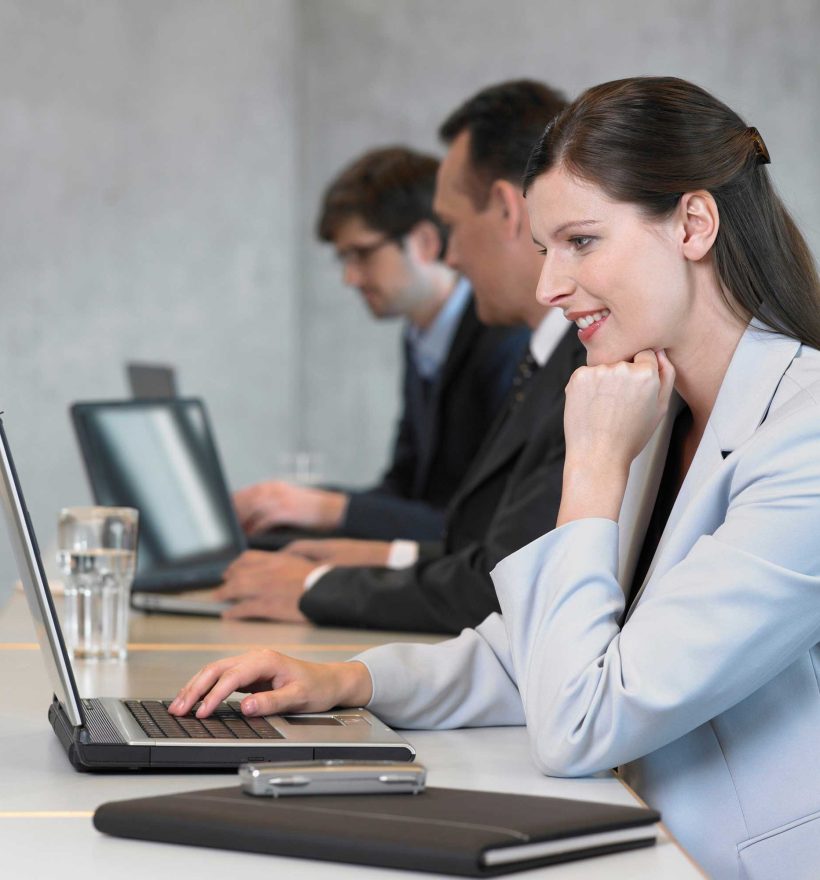 Businesswoman using laptop